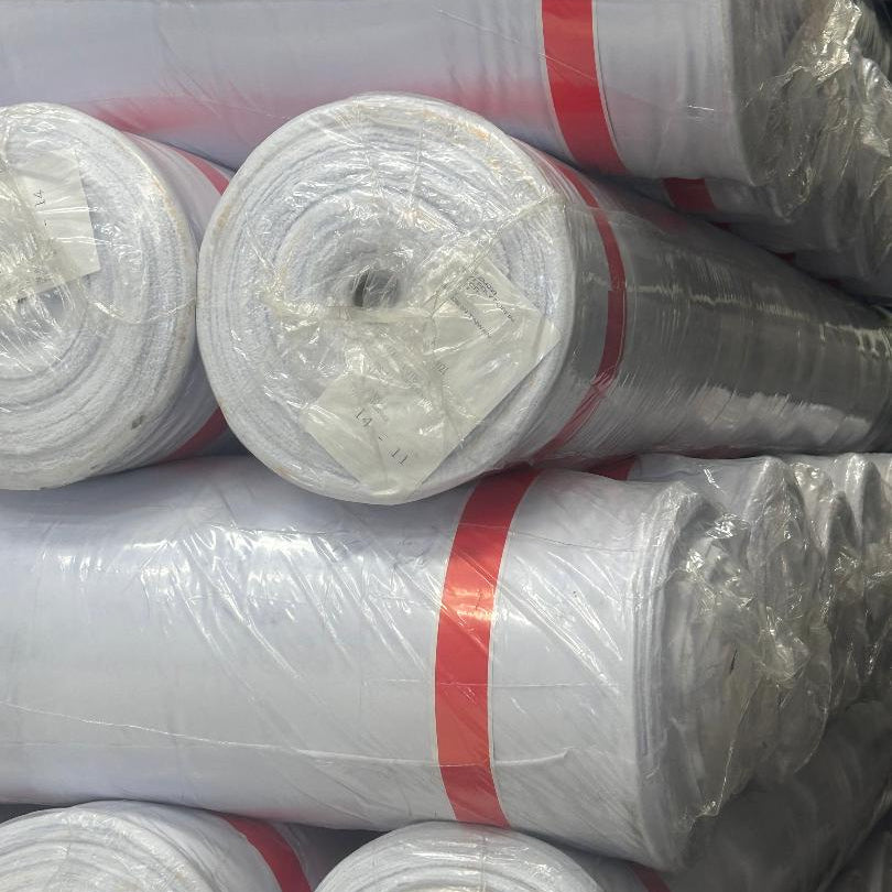 white poly poplin fabric 100 yard continuous roll wrapped in protective plastic on tube ready for shipment