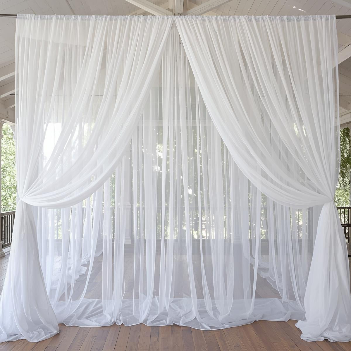 layered white 120 inch voile fabric used for sheer backdrop and window draping